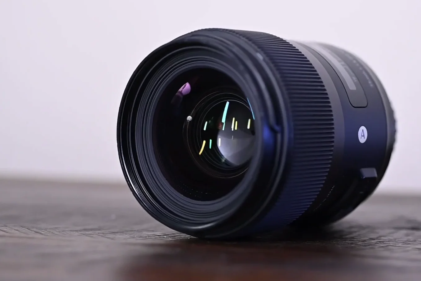 Close up of the front element of the Sigma 35mm lens showing glass coating