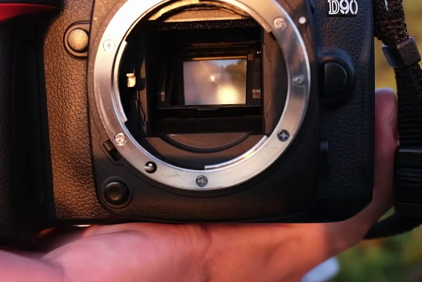 Nikon D90 lens mount showing screw drive motor
