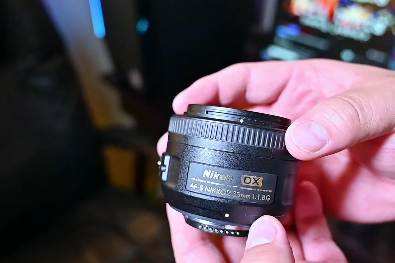 Side profile of the Nikon 35mm lens showing the AF/MF switch