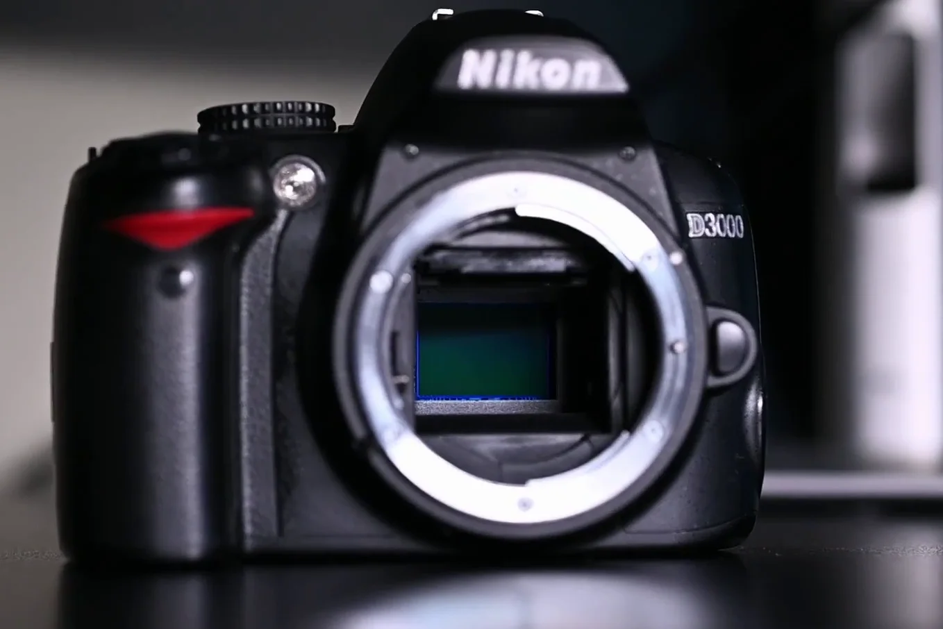 The Nikon D3000 mirror box and CCD sensor exposed