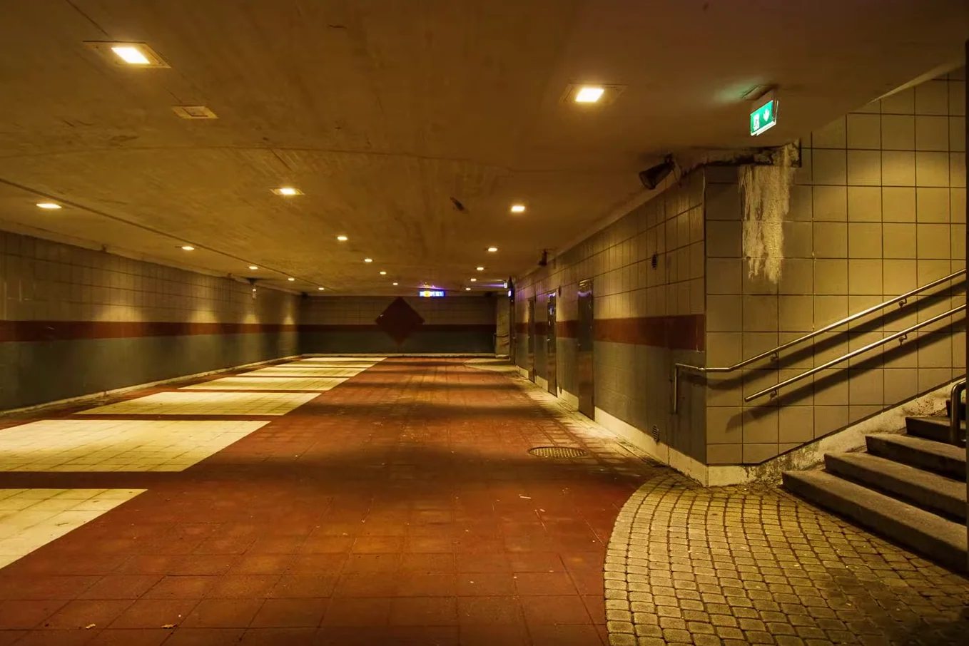 Dimly lit pedestrian tunnel shot at high ISO