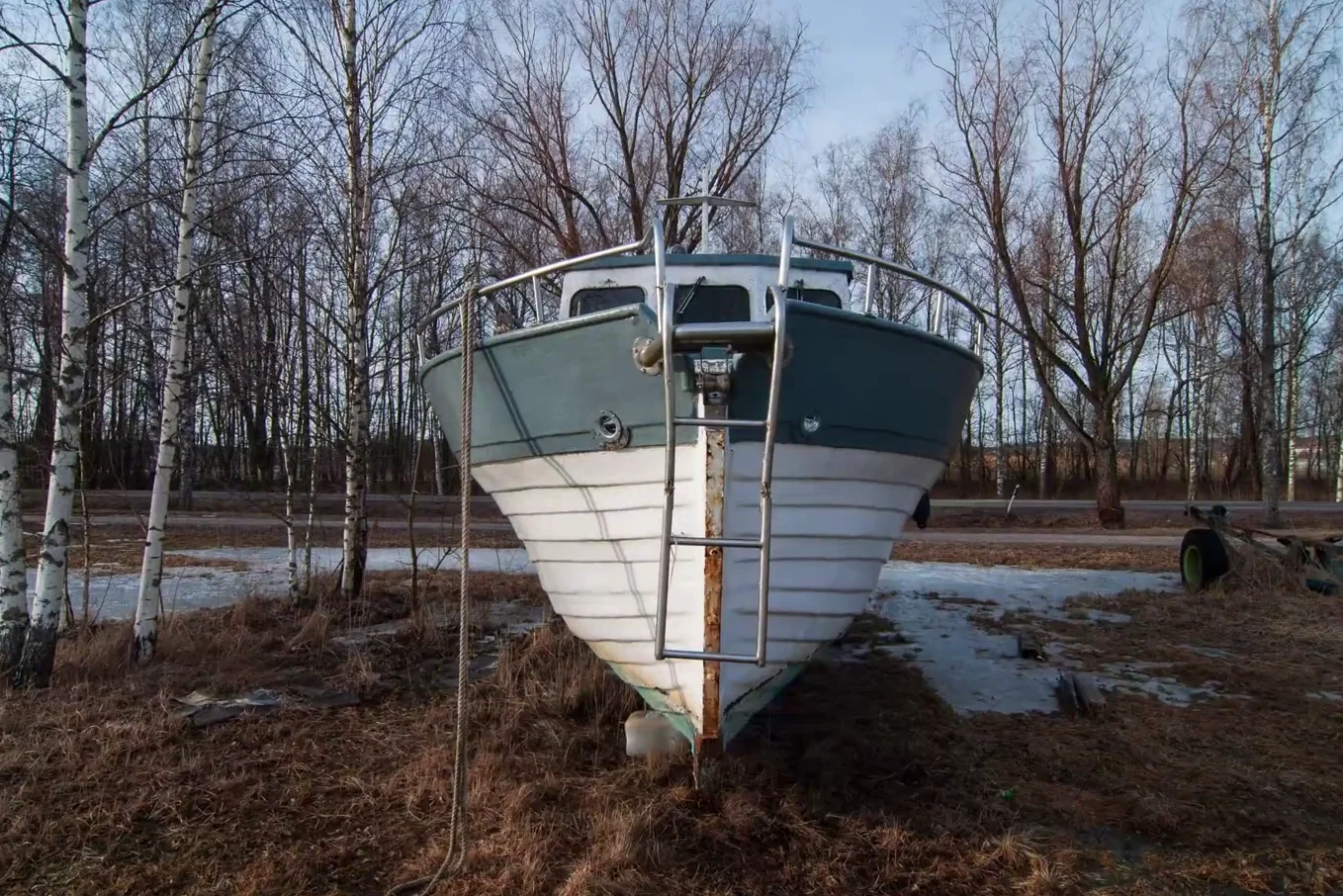 Front view of a boat on land taken with wide angle lens